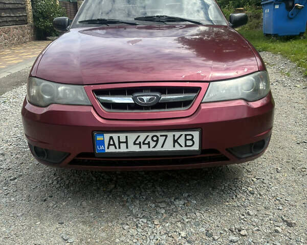 Красный Дэу Нексия, объемом двигателя 1.5 л и пробегом 118 тыс. км за 2000 $, фото 1 на Automoto.ua