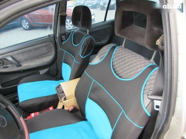 Дэу Нексия, объемом двигателя 0 л и пробегом 349 тыс. км за 1998 $, фото 8 на Automoto.ua