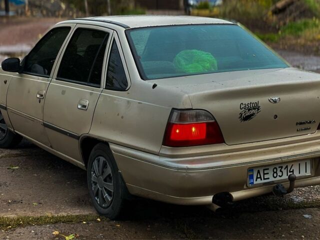 Жовтий Деу Нексія, об'ємом двигуна 1.5 л та пробігом 400 тис. км за 1100 $, фото 3 на Automoto.ua