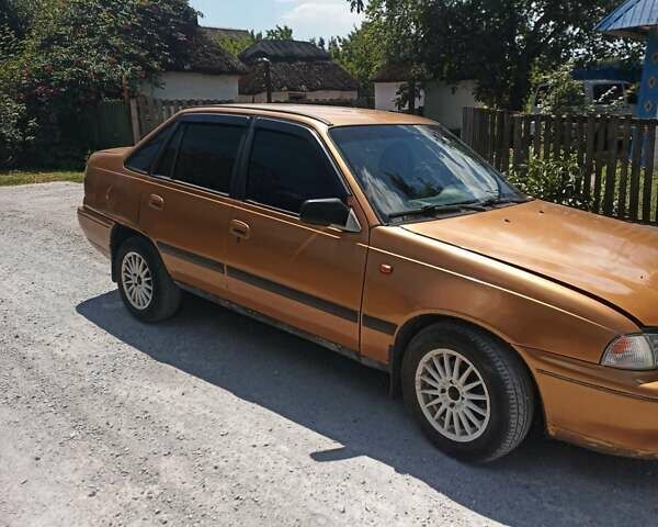 Жовтий Деу Нексія, об'ємом двигуна 2 л та пробігом 319 тис. км за 1976 $, фото 6 на Automoto.ua