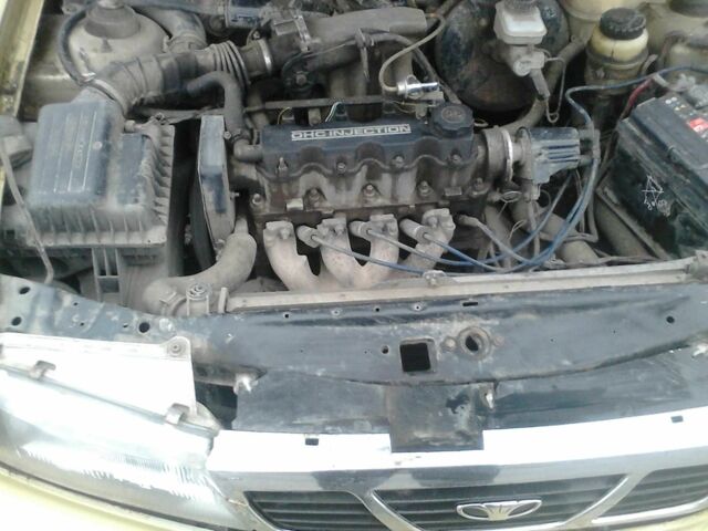 Желтый Дэу Нексия, объемом двигателя 1.5 л и пробегом 300 тыс. км за 1500 $, фото 14 на Automoto.ua