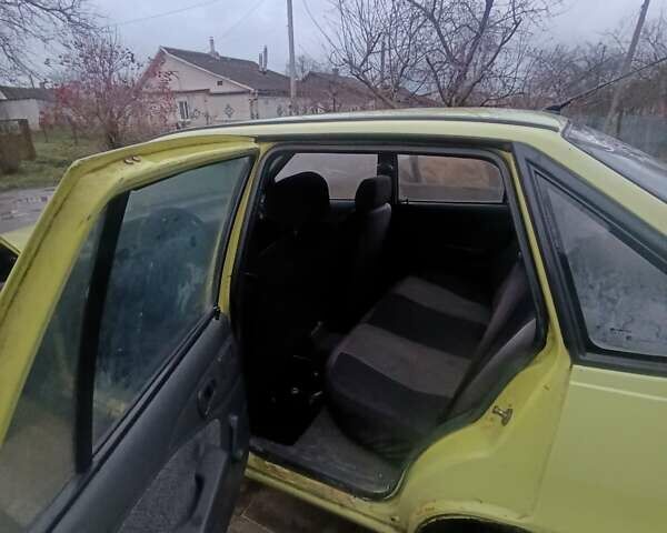 Жовтий Деу Нексія, об'ємом двигуна 1.5 л та пробігом 215 тис. км за 799 $, фото 9 на Automoto.ua