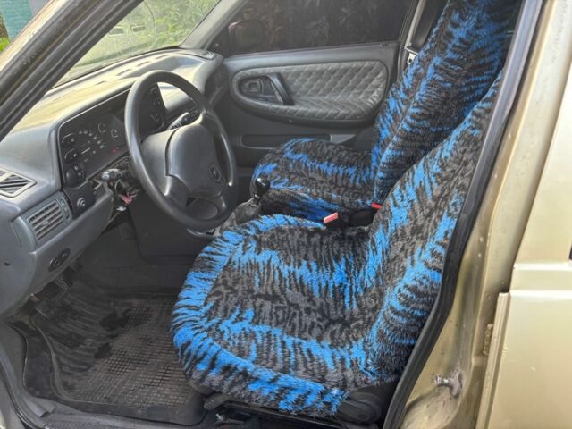 Желтый Дэу Нексия, объемом двигателя 1.5 л и пробегом 300 тыс. км за 1050 $, фото 8 на Automoto.ua