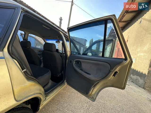 Жовтий Деу Нексія, об'ємом двигуна 1.5 л та пробігом 240 тис. км за 1499 $, фото 26 на Automoto.ua