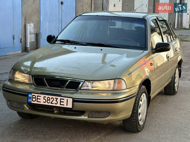 Жовтий Деу Нексія, об'ємом двигуна 1.5 л та пробігом 240 тис. км за 1499 $, фото 9 на Automoto.ua