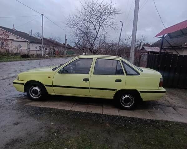 Жовтий Деу Нексія, об'ємом двигуна 1.5 л та пробігом 215 тис. км за 799 $, фото 6 на Automoto.ua