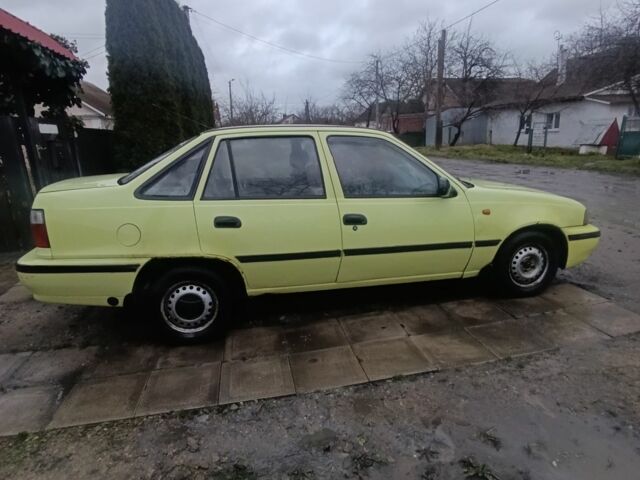 Жовтий Деу Нексія, об'ємом двигуна 1.5 л та пробігом 215 тис. км за 799 $, фото 6 на Automoto.ua