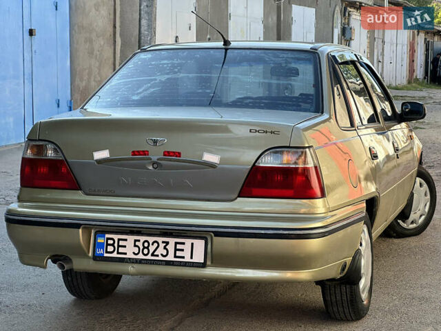 Жовтий Деу Нексія, об'ємом двигуна 1.5 л та пробігом 240 тис. км за 1499 $, фото 17 на Automoto.ua