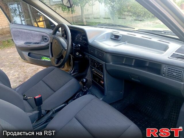 Желтый Дэу Нексия, объемом двигателя 1.5 л и пробегом 230 тыс. км за 2100 $, фото 11 на Automoto.ua