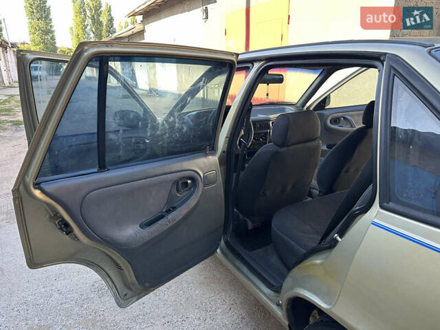Жовтий Деу Нексія, об'ємом двигуна 1.5 л та пробігом 240 тис. км за 1499 $, фото 29 на Automoto.ua