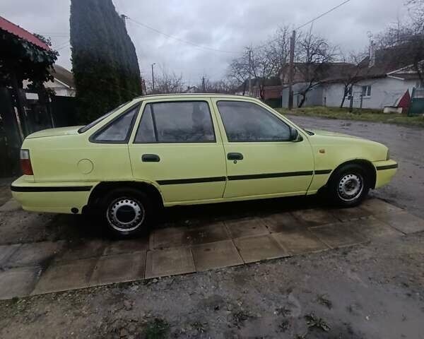 Жовтий Деу Нексія, об'ємом двигуна 1.5 л та пробігом 215 тис. км за 799 $, фото 7 на Automoto.ua