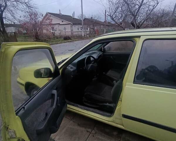 Жовтий Деу Нексія, об'ємом двигуна 1.5 л та пробігом 215 тис. км за 799 $, фото 8 на Automoto.ua