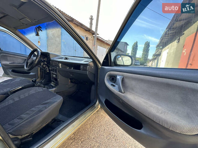 Жовтий Деу Нексія, об'ємом двигуна 1.5 л та пробігом 240 тис. км за 1499 $, фото 24 на Automoto.ua