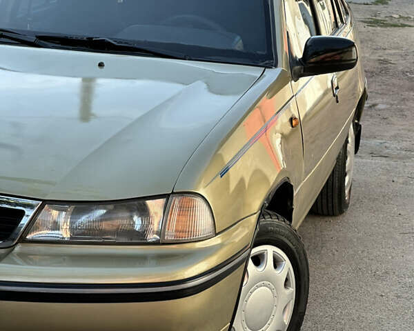 Жовтий Деу Нексія, об'ємом двигуна 1.5 л та пробігом 240 тис. км за 1499 $, фото 6 на Automoto.ua