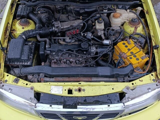 Жовтий Деу Нексія, об'ємом двигуна 1.5 л та пробігом 215 тис. км за 799 $, фото 4 на Automoto.ua