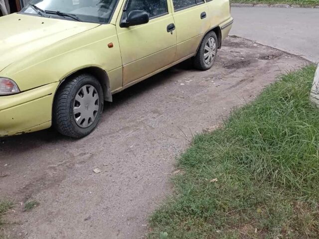 Жовтий Деу Нексія, об'ємом двигуна 1.5 л та пробігом 215 тис. км за 900 $, фото 7 на Automoto.ua