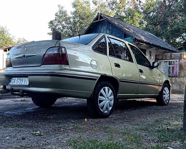 Жовтий Деу Нексія, об'ємом двигуна 1.5 л та пробігом 185 тис. км за 2000 $, фото 2 на Automoto.ua