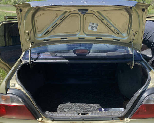 Желтый Дэу Нексия, объемом двигателя 1.5 л и пробегом 158 тыс. км за 1900 $, фото 6 на Automoto.ua