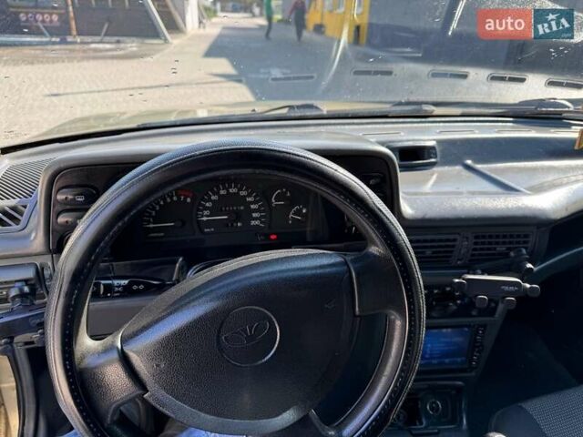 Желтый Дэу Нексия, объемом двигателя 1.5 л и пробегом 170 тыс. км за 1400 $, фото 6 на Automoto.ua