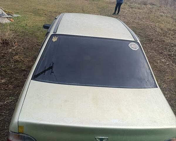 Желтый Дэу Нексия, объемом двигателя 1.5 л и пробегом 162 тыс. км за 1400 $, фото 2 на Automoto.ua