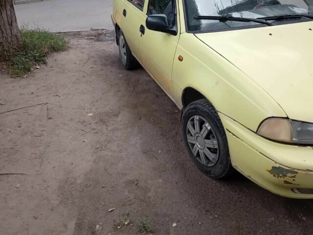 Жовтий Деу Нексія, об'ємом двигуна 1.5 л та пробігом 215 тис. км за 900 $, фото 4 на Automoto.ua