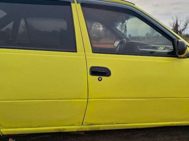 Жовтий Деу Нексія, об'ємом двигуна 1 л та пробігом 170 тис. км за 1090 $, фото 5 на Automoto.ua