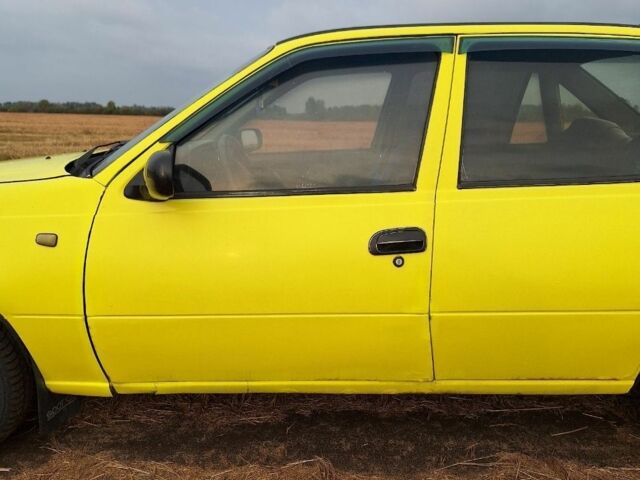 Жовтий Деу Нексія, об'ємом двигуна 1 л та пробігом 170 тис. км за 1090 $, фото 1 на Automoto.ua