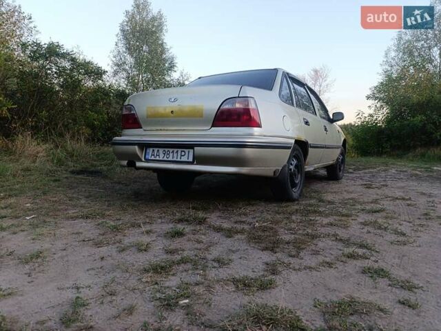 Жовтий Деу Нексія, об'ємом двигуна 1.6 л та пробігом 165 тис. км за 1500 $, фото 4 на Automoto.ua