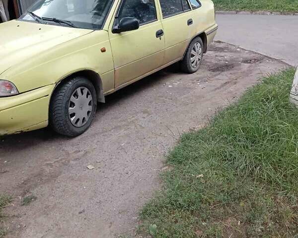 Жовтий Деу Нексія, об'ємом двигуна 1.5 л та пробігом 215 тис. км за 900 $, фото 7 на Automoto.ua