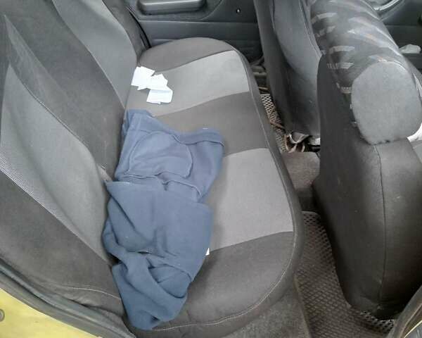 Жовтий Деу Нексія, об'ємом двигуна 1.5 л та пробігом 215 тис. км за 900 $, фото 3 на Automoto.ua