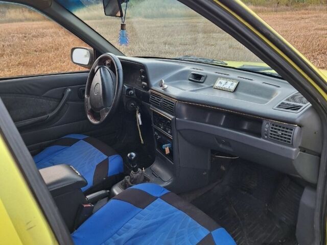 Жовтий Деу Нексія, об'ємом двигуна 1 л та пробігом 170 тис. км за 1090 $, фото 7 на Automoto.ua