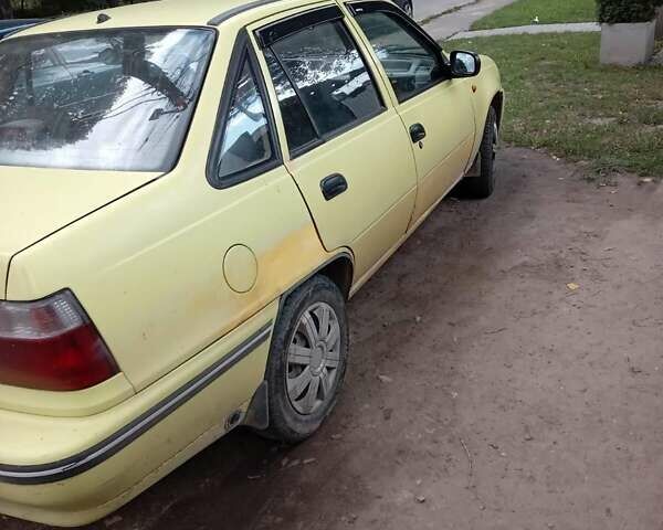 Жовтий Деу Нексія, об'ємом двигуна 1.5 л та пробігом 215 тис. км за 900 $, фото 6 на Automoto.ua