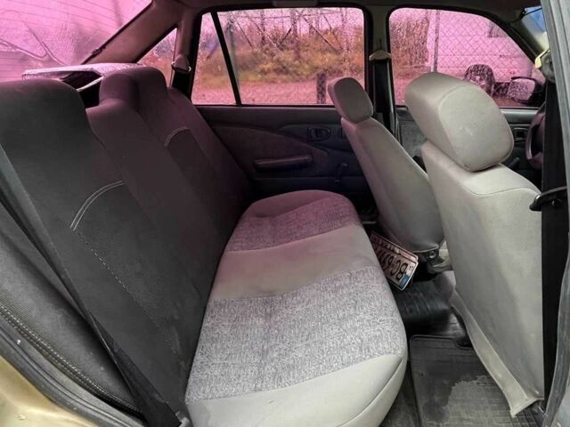 Жовтий Деу Нексія, об'ємом двигуна 1.5 л та пробігом 450 тис. км за 1500 $, фото 14 на Automoto.ua
