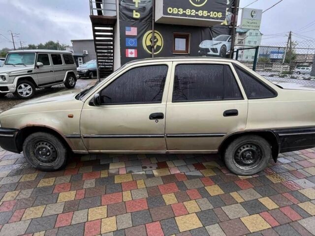 Жовтий Деу Нексія, об'ємом двигуна 1.5 л та пробігом 450 тис. км за 1500 $, фото 3 на Automoto.ua
