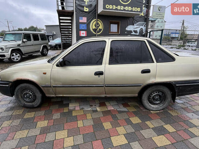 Жовтий Деу Нексія, об'ємом двигуна 1.5 л та пробігом 450 тис. км за 1500 $, фото 3 на Automoto.ua