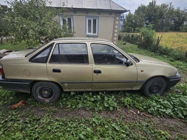 Жовтий Деу Нексія, об'ємом двигуна 1.5 л та пробігом 150 тис. км за 996 $, фото 5 на Automoto.ua
