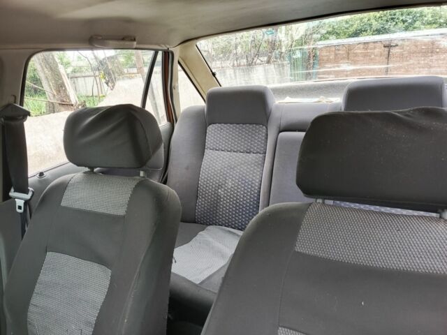 Жовтий Деу Нексія, об'ємом двигуна 1.6 л та пробігом 210 тис. км за 1402 $, фото 3 на Automoto.ua