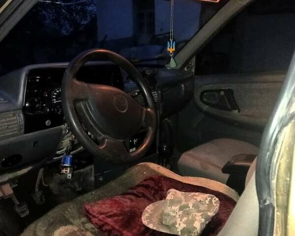 Жовтий Деу Нексія, об'ємом двигуна 1.5 л та пробігом 185 тис. км за 2000 $, фото 7 на Automoto.ua
