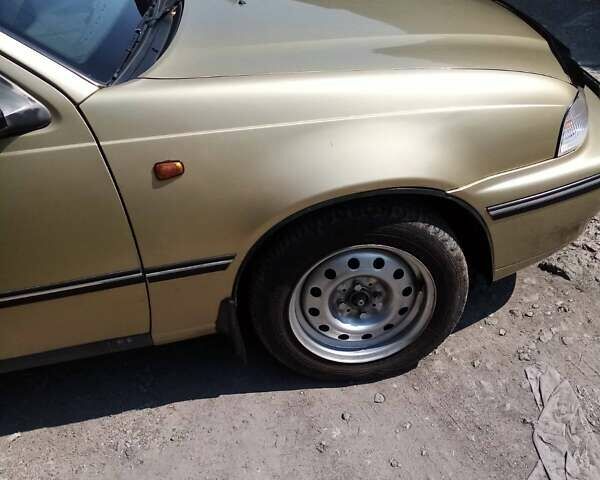 Жовтий Деу Нексія, об'ємом двигуна 1.5 л та пробігом 300 тис. км за 2000 $, фото 4 на Automoto.ua