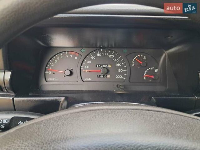 Жовтий Деу Нексія, об'ємом двигуна 1.5 л та пробігом 205 тис. км за 1399 $, фото 16 на Automoto.ua