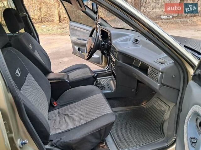 Жовтий Деу Нексія, об'ємом двигуна 1.5 л та пробігом 205 тис. км за 1399 $, фото 27 на Automoto.ua