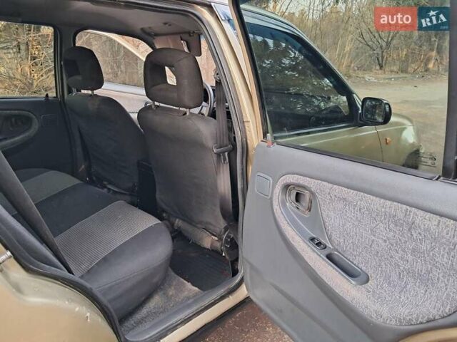 Жовтий Деу Нексія, об'ємом двигуна 1.5 л та пробігом 205 тис. км за 1399 $, фото 24 на Automoto.ua