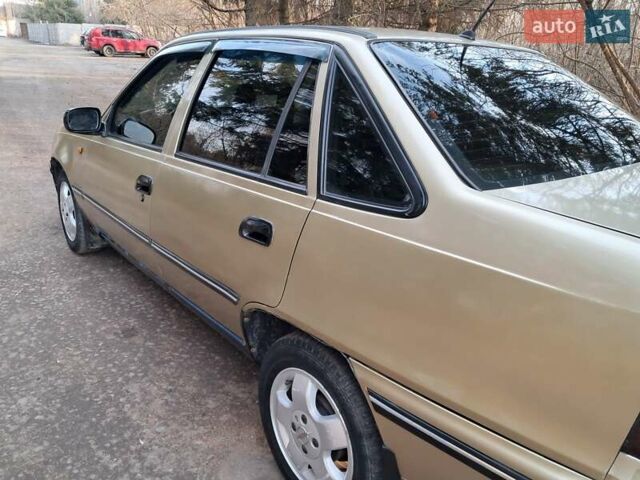 Жовтий Деу Нексія, об'ємом двигуна 1.5 л та пробігом 205 тис. км за 1399 $, фото 8 на Automoto.ua