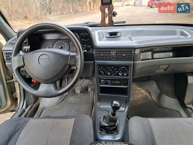 Жовтий Деу Нексія, об'ємом двигуна 1.5 л та пробігом 205 тис. км за 1399 $, фото 30 на Automoto.ua