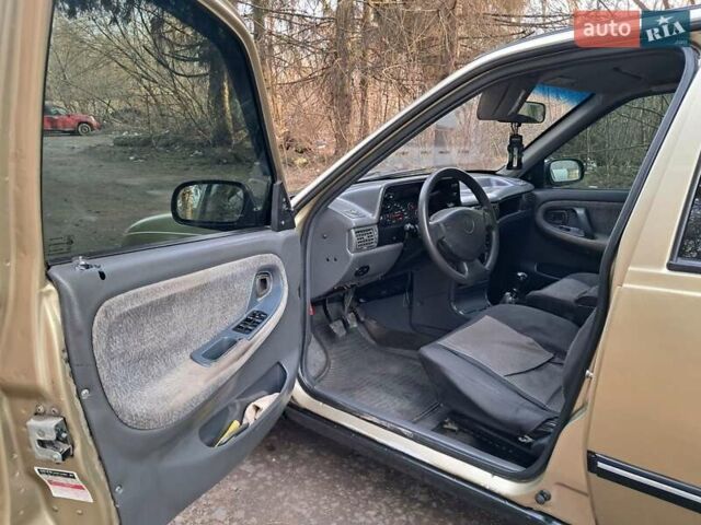 Жовтий Деу Нексія, об'ємом двигуна 1.5 л та пробігом 205 тис. км за 1399 $, фото 19 на Automoto.ua