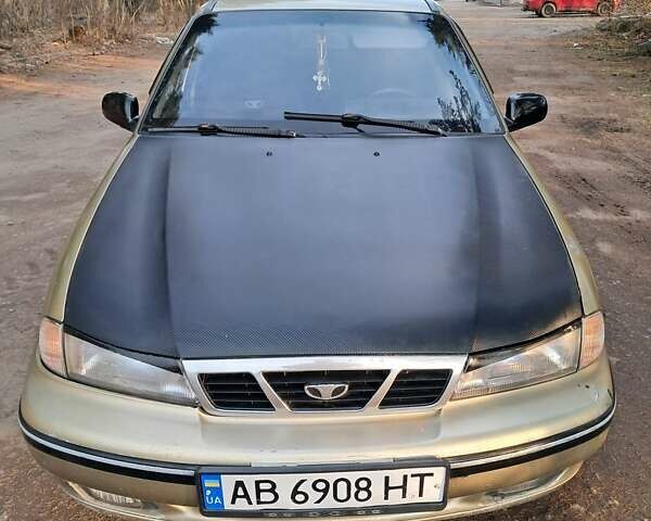 Жовтий Деу Нексія, об'ємом двигуна 1.5 л та пробігом 205 тис. км за 1399 $, фото 2 на Automoto.ua
