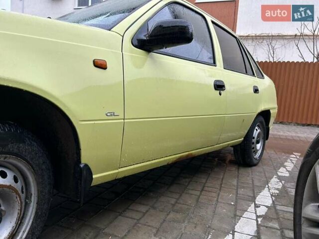 Жовтий Деу Нексія, об'ємом двигуна 1.5 л та пробігом 186 тис. км за 2000 $, фото 6 на Automoto.ua