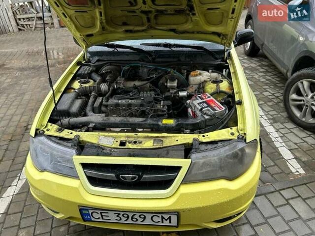 Жовтий Деу Нексія, об'ємом двигуна 1.5 л та пробігом 186 тис. км за 2000 $, фото 11 на Automoto.ua