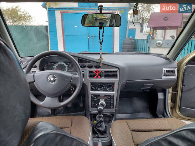 Жовтий Деу Нексія, об'ємом двигуна 1.6 л та пробігом 60 тис. км за 3350 $, фото 11 на Automoto.ua