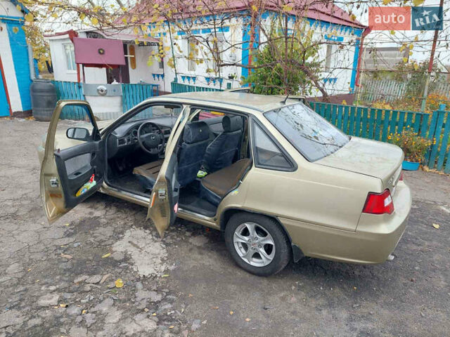 Жовтий Деу Нексія, об'ємом двигуна 1.6 л та пробігом 60 тис. км за 3350 $, фото 7 на Automoto.ua